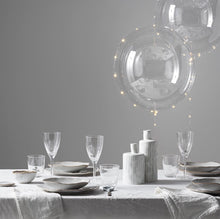 Charger l'image dans la galerie, LED Balloons on dining table in Geneva Switzerland