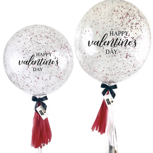 red confetti bubble valentine's balloon with red tassle and black ribbon in medium and large size